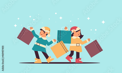 elves with purchases preparing for new year and christmas holidays celebration santa helpers holding shopping boxes