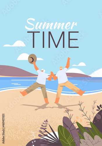 senior couple dancing old man and woman having fun active old age concept seascape background
