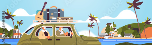 old family driving in car on weekly holiday senior travelers couple traveling by active old age concept