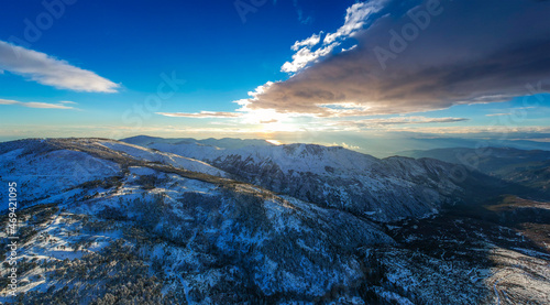 Aerial view of the snowy mountain Taygetus (also known as Taugetus or Taygetos) above Messenia unit in Peloponnese, Greece. Amazing natural scenery of the highest mountain in Peloponnese during winter photo