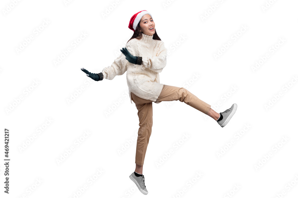 Asian woman with winter gloves and Santa hat Asian woman with winter gloves and Santa hat