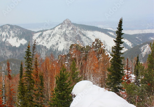 Winter landscape with a view of the rock 