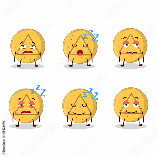 Cartoon character of dalgona candy triangle with sleepy expression