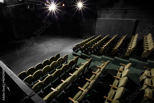  small auditorium with green armchairs