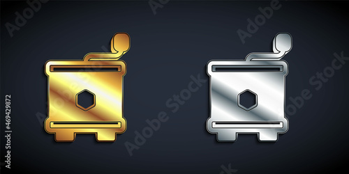 Gold and silver Honey extractor icon isolated on black background. Mechanical device for honey extraction from honeycombs. Long shadow style. Vector