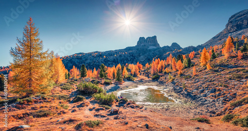 Aerial morning view of frozen Limides lake. Colorful autumn landscape of Dolomite Alps. Spectacular outdoor scene of Falzarego pass, Italy, Europe. Beauty of nature concept background. © Andrew Mayovskyy