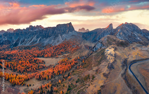 Aerial landscape photography. Breathtaking morning view from the top of Giau pass. Gorgeous autumn sunrise in Dolomite Alps, Cortina d'Ampezzo location, Italy. Beauty of nature concept background.