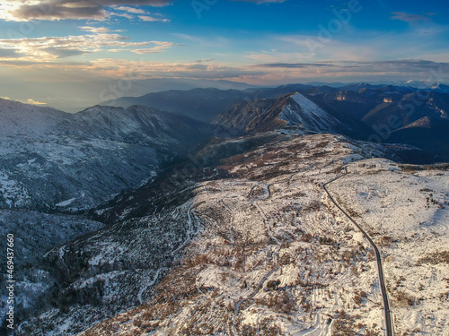 Aerial view of the snowy mountain Taygetus (also known as Taugetus or Taygetos) above Messenia unit in Peloponnese, Greece. Amazing natural scenery of the highest mountain in Peloponnese during winter photo