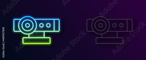 Glowing neon line Web camera icon isolated on black background. Chat camera. Webcam icon. Vector