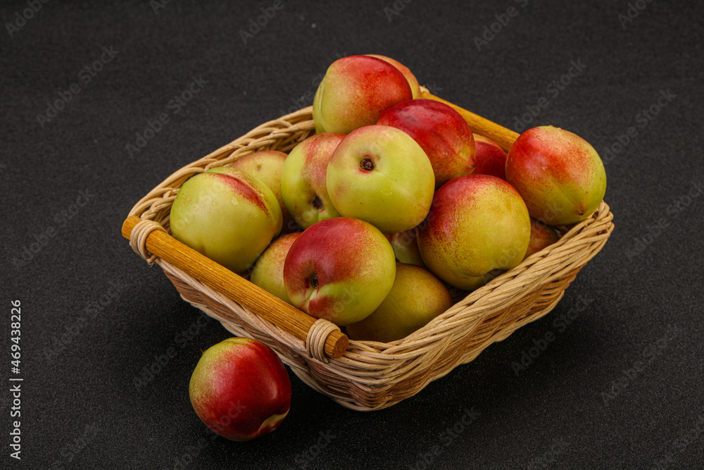 Sweet small nectarines in the basket Sweet small nectarines in the basket