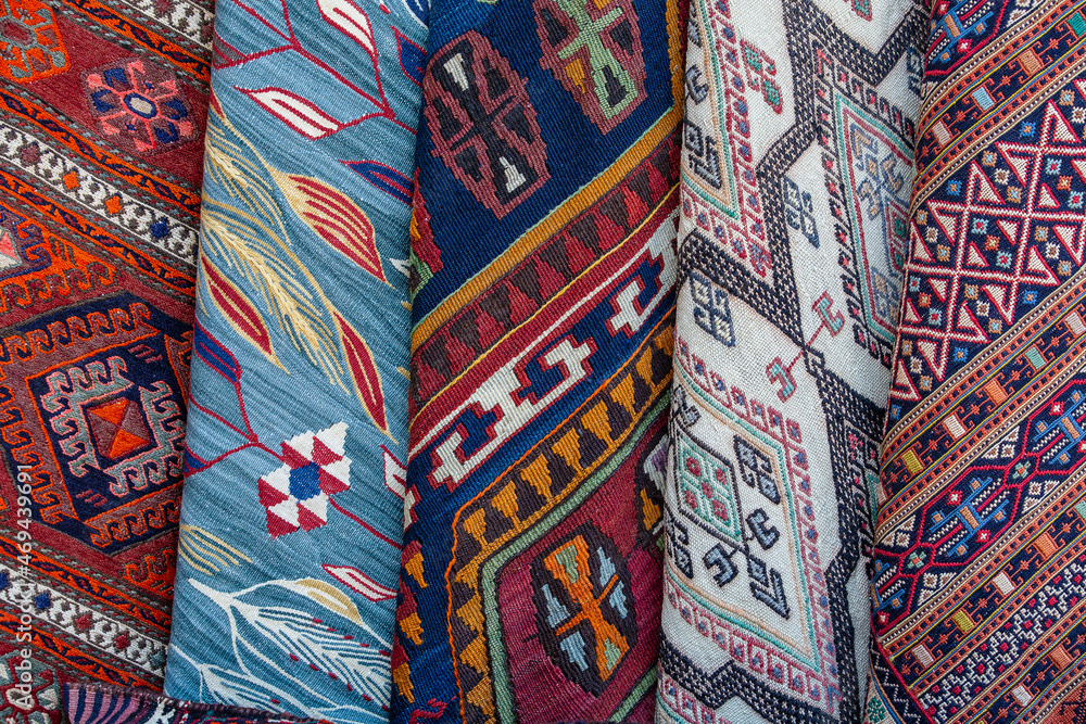 Traditional carpets for sell at a street market stall in Turkey Traditional carpets for sell at a street market stall in Turkey