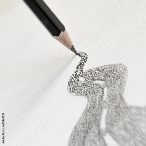 gray graphite pencil draws the road