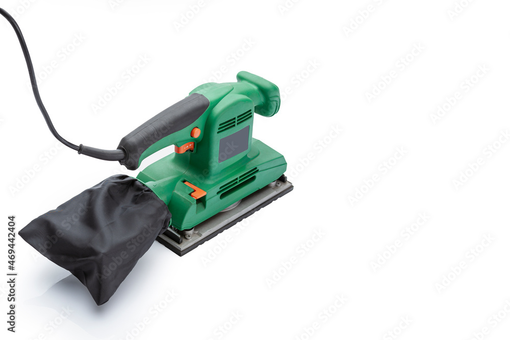 Professional tool electric hand vibration grinder isolated on white background. Electric hand tools. Professional tool electric hand vibration grinder isolated on white background. Electric hand tools.
