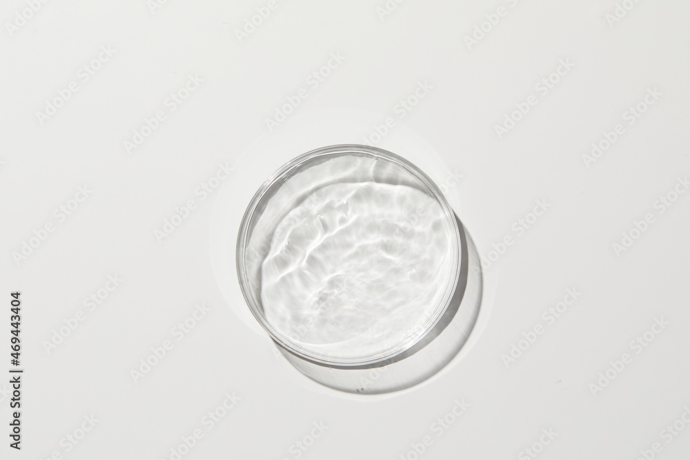 Petri dish with ripple in grey background Petri dish with ripple in grey background