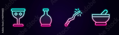 Set line Medieval goblet, Bottle with potion, Magic wand and Witch cauldron. Glowing neon icon. Vector