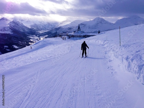 skiing in the mountains