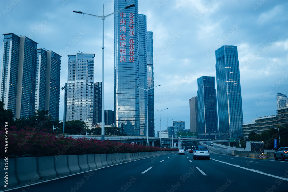 Shenzhen,China - Circa November 2021: Driving car on street in Shenzhen city, China