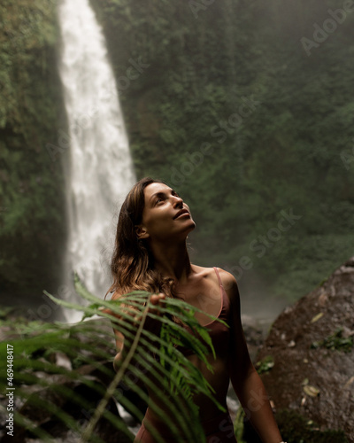 portrait of a women on a background of the jungle.