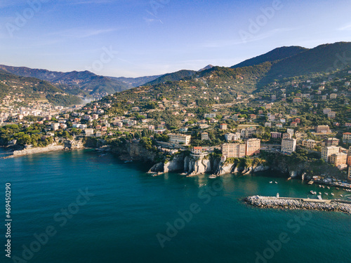 Aerial view of Italian coastline. Genova area, Camogli city. City next to the big cliffs. Mediterranean sea in liguria coast. 