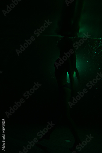 beautiful girl dancing underwater.