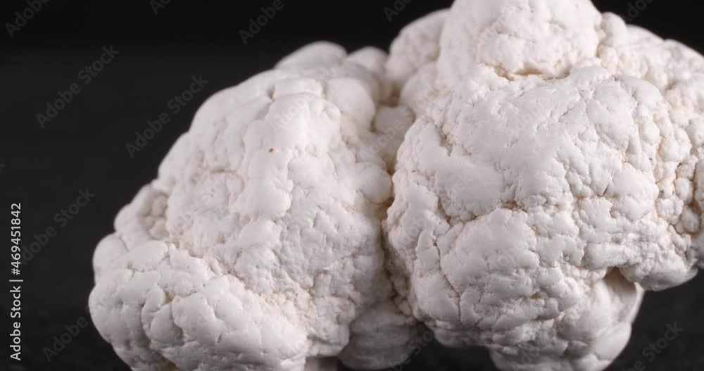 Magnesite. It is used in industry, lithotherapy, jewelry. Close-up of the structure of the stone. Magnesite. It is used in industry, lithotherapy, jewelry. Close-up of the structure of the stone.