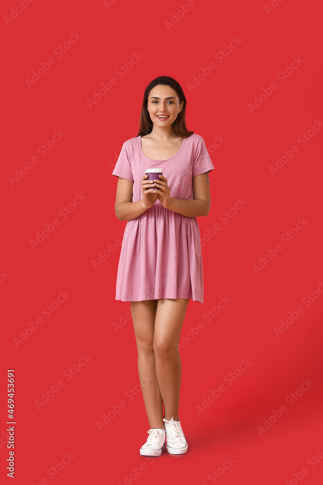 Beautiful woman with cup of coffee on color background Beautiful woman with cup of coffee on color background