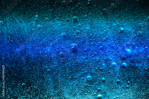 frozen water drops blue background