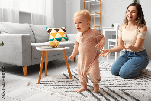 Cute baby girl in bodysuit ...