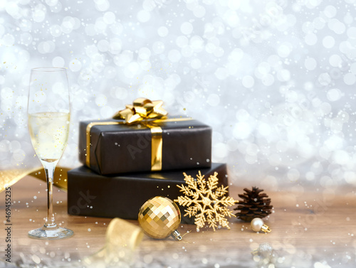 Christmas gift box and champaign with ornament decoration on bokeh background Fotobehang
