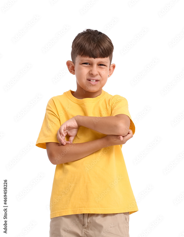 Little boy scratching himself on white background Little boy scratching himself on white background
