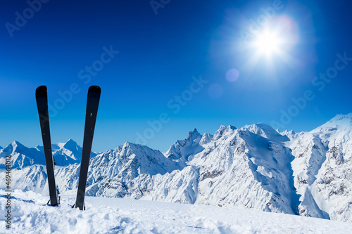 Skiing in the Swiss Alps. Ski, winter season, mountains and ski equipments © olyphotostories