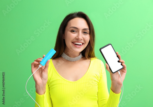 Young woman with phone and ...