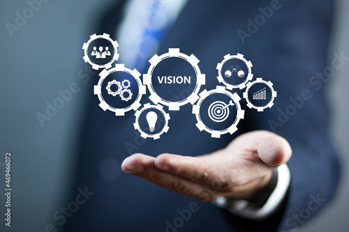 businessman holding vision on virtual screens