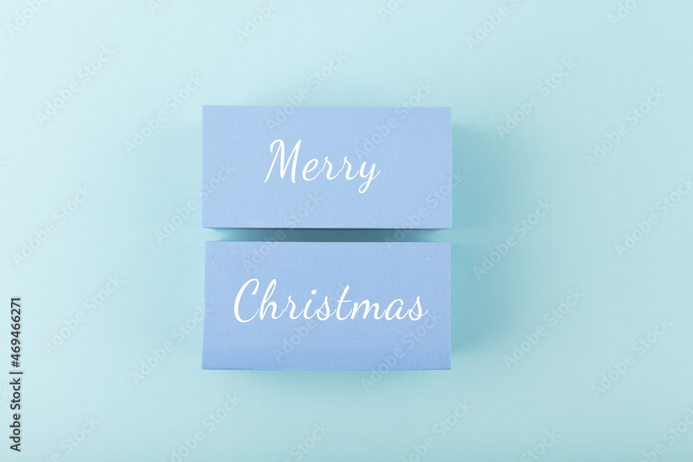Merry Christmas minimal modern concept in light pastel blue colors Merry Christmas minimal modern concept in light pastel blue colors