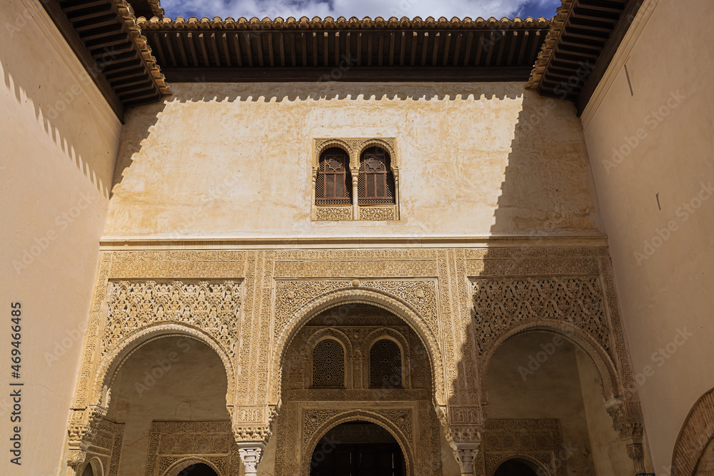 Richly decorated upper part of the Patio del Mexuar in the Nasrid Palaces in the Alhambra