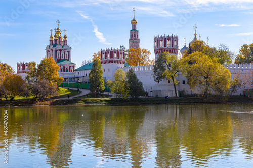 View of the Novodevichy convent (Bogoroditse-Smolensky monastery) and the big Novodevichy pond on a sunny autumn day. Moscow, Russia. UNESCO world heritage site