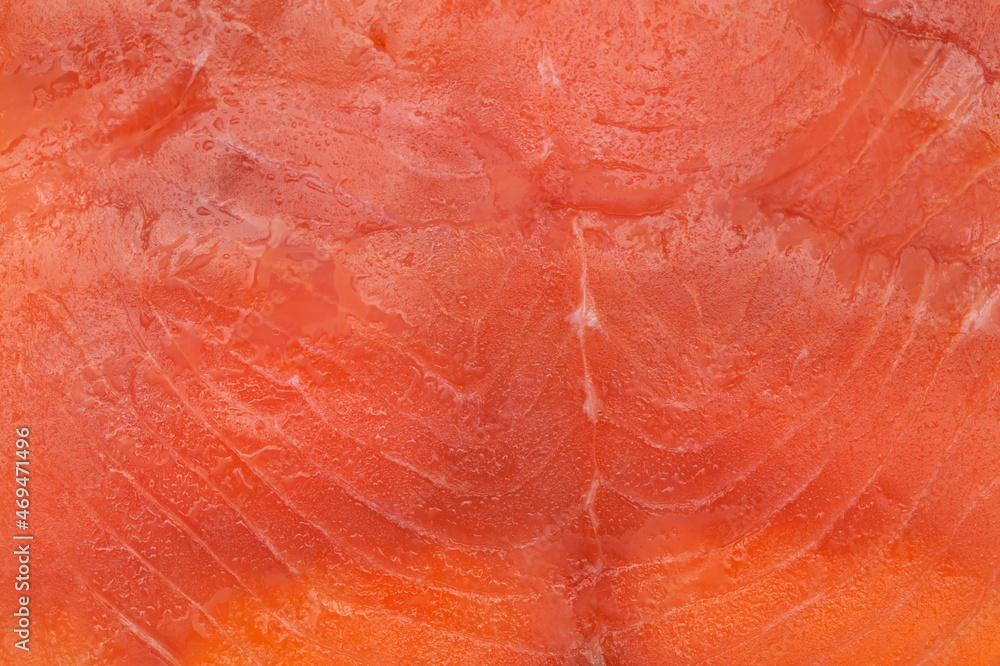 thin slices of Smoked salmon macro food background