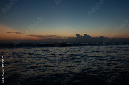 ocean view during sunset. © alexzhilkin