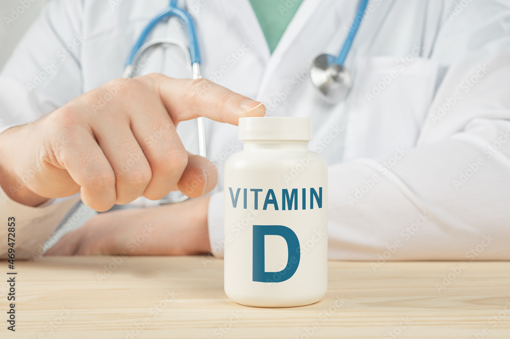 Essential vitamin D and minerals for humans. doctor recommends taking vitamin D. doctor talks about Benefits of vitamin D. D Vitamin - Health Concept Essential vitamin D and minerals for humans. doctor recommends taking vitamin D. doctor talks about Benefits of vitamin D. D Vitamin - Health Concept