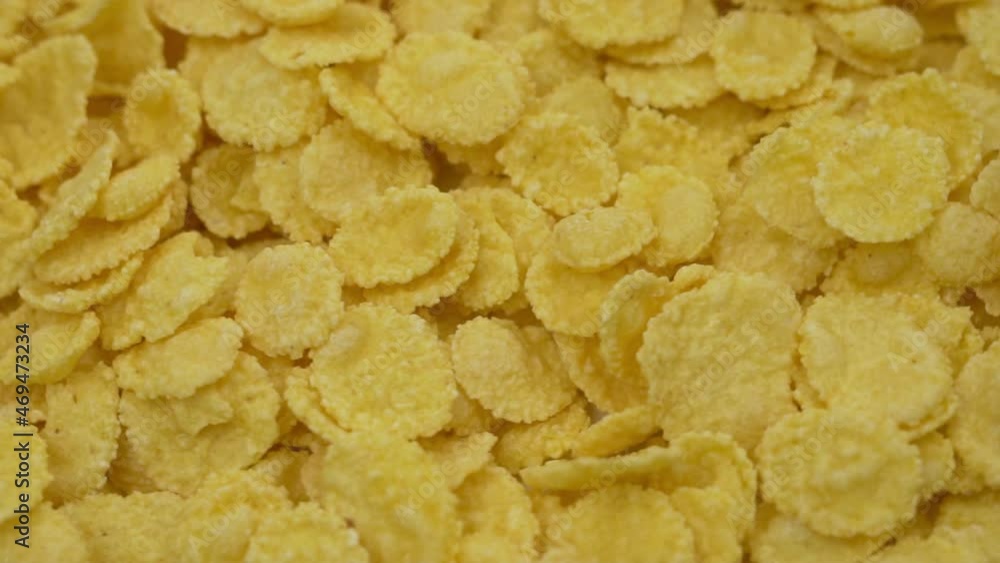 Cornflakes, Healthy Breakfast, Close-up. Insulated Cornflakes. Background of Yellow Cornflakes. Healthy Vegan Vitamin Food and Nutrition. Cornflakes, Healthy Breakfast, Close-up. Insulated Cornflakes. Background of Yellow Cornflakes. Healthy Vegan Vitamin Food and Nutrition.