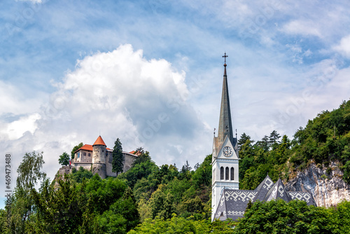View of a church and Bled Castle in Slovenia