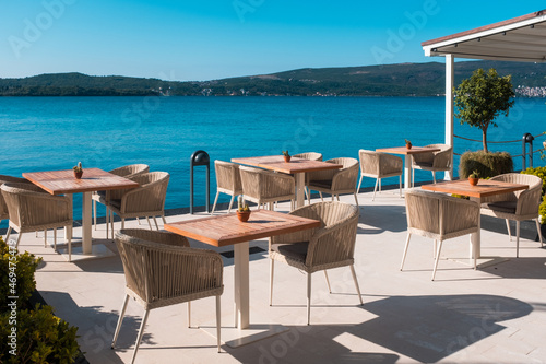 Empty chair and table with outdoor view. Tivat Porto Montenegro  © Renat