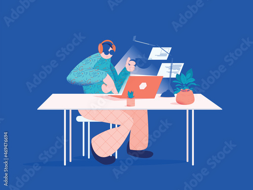 Digital freelancer man works in a nicely decorated modern office on a laptop