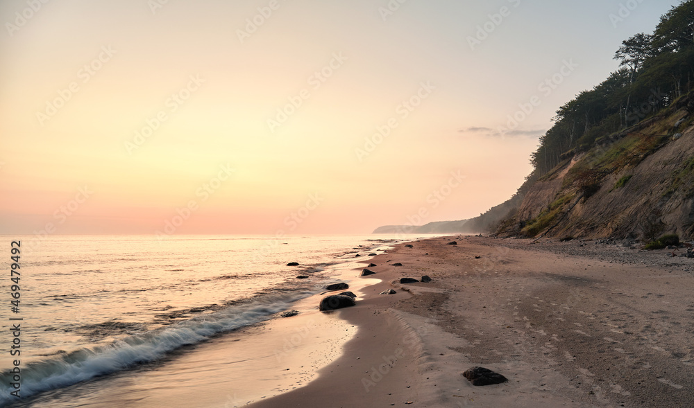 Empty beach in Miedzyzdroje at sunrise, Poland.