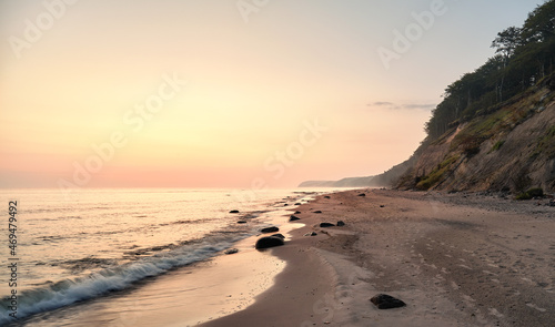 Empty beach in Miedzyzdroje at sunrise  Poland.