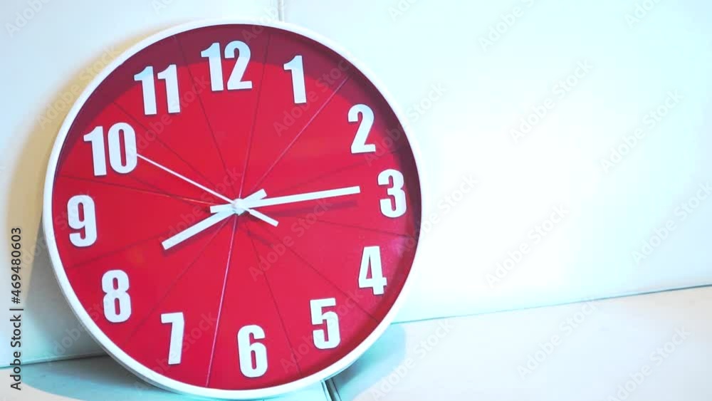 Christmas time concept A large red clock displays a text area background. Waiting to celebrate. Christmas time concept A large red clock displays a text area background. Waiting to celebrate.