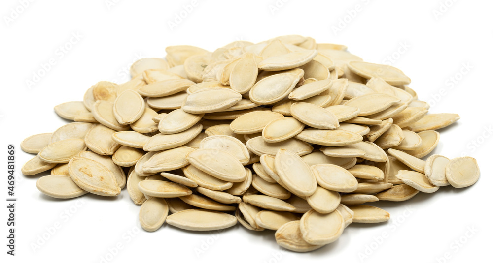 Pumpkin seeds isolated on white background. Snack fresh nuts. close-up nuts Pumpkin seeds isolated on white background. Snack fresh nuts. close-up nuts