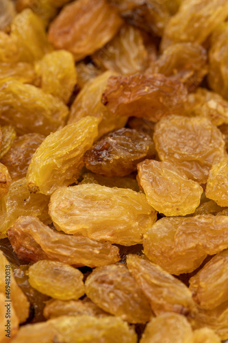 Close-up of dried raisins. food background. Snack fresh nuts. close-up nuts. Story format