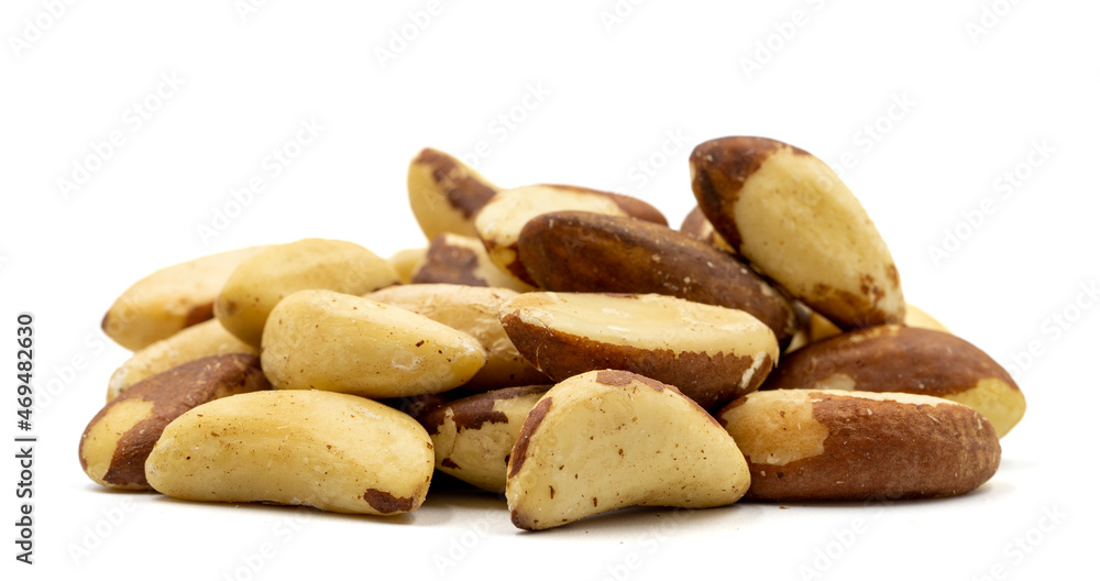 Brazil nut isolated on white background. Snack nuts. Close-up. Brazil nut isolated on white background. Snack nuts. Close-up.