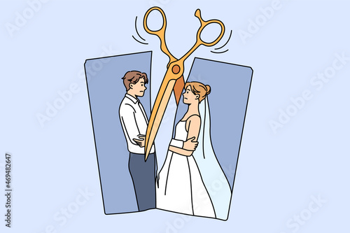 Breaking up and divorce concept. Photo of young married couple cartoon characters standing hugging and scissors cutting photo into pieces vector illustration 